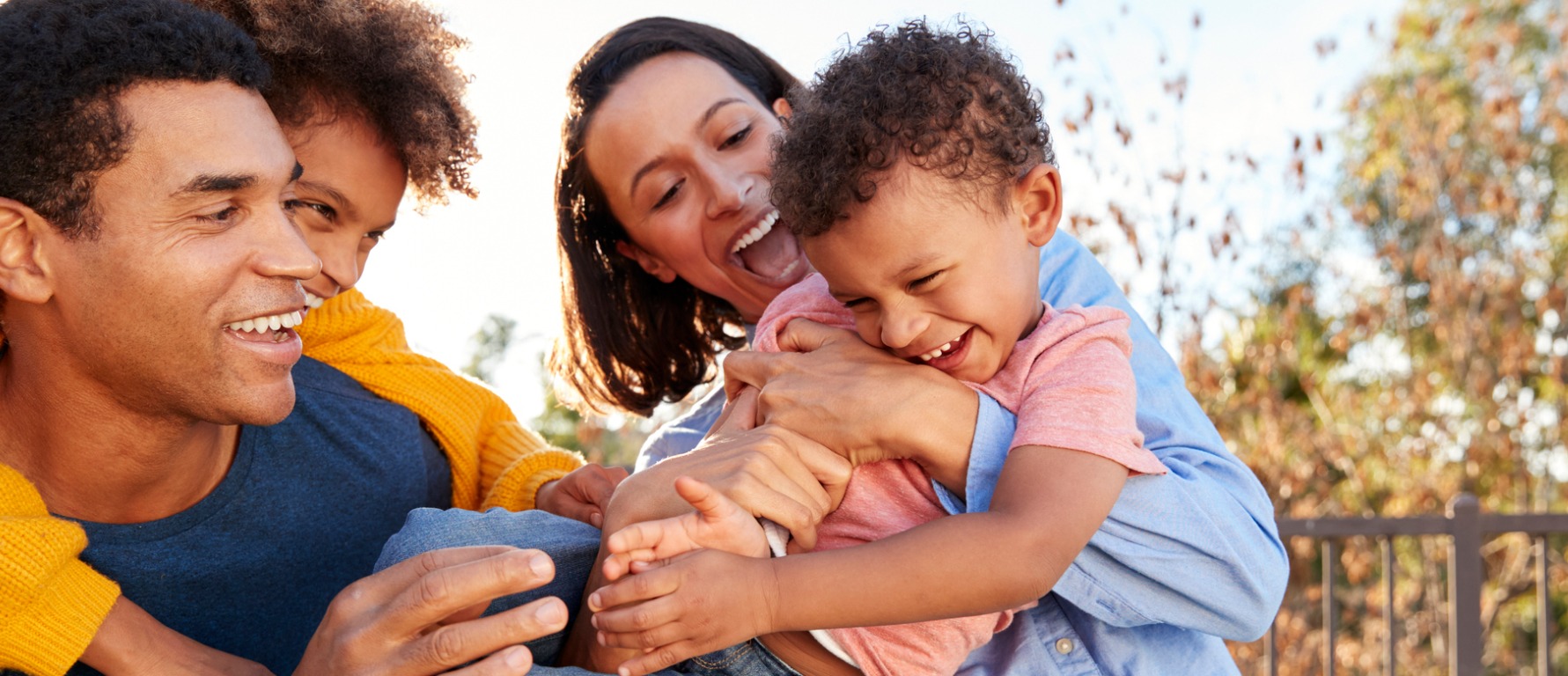 Family laughing and smiling